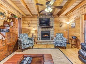 Cabin, Multiple Beds, Hot Tub, Mountain View | Living room | 42-inch TV with cable channels, fireplace - Sunset Lodge, 3 Bedrooms, Hot Tub, Fireplace (Sevierville)