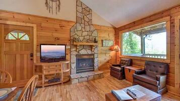 Cabin, 1 King Bed, Hot Tub, Mountain View | Living room | 42-inch TV with cable channels, fireplace