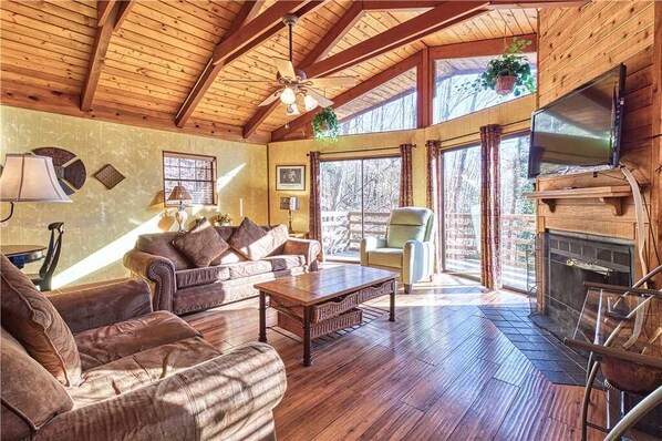 Cabin, Multiple Beds, Hot Tub | Living room | 42-inch TV with cable channels, fireplace, MP3 dock - Creekside, 4 Bedrooms, Pool Access, Wifi, Hot Tub, Fireplace, Sleeps 10 (Gatlinburg)