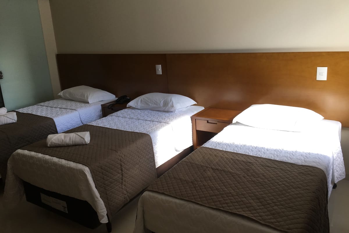 Standard Triple Room | Minibar, desk, laptop workspace, free cots/infant beds