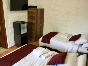 Ropa de cama de alta calidad y minibar 