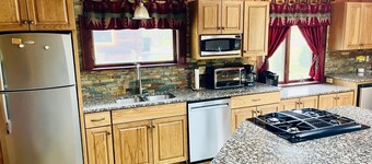 Wooded cabin in the Laurel Highlands with beautiful yard and native trout stream