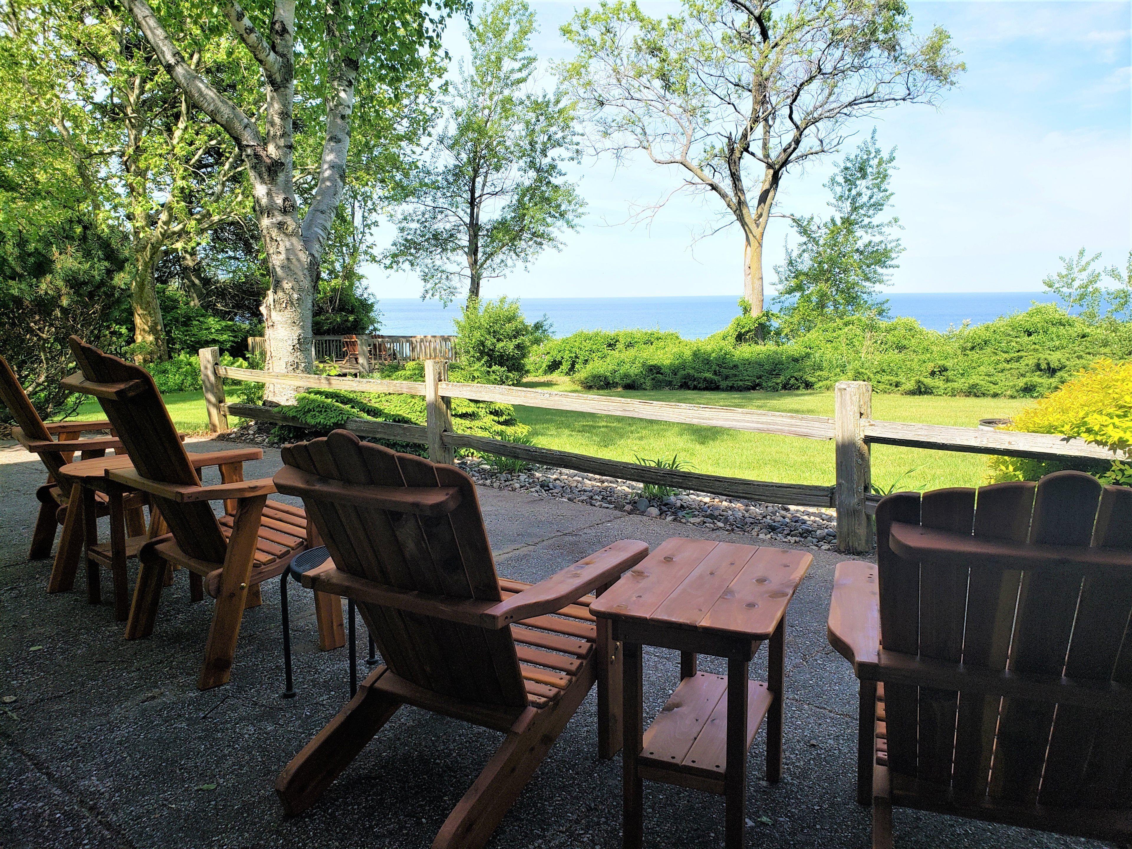 Outdoor seating with a view of the ocean.