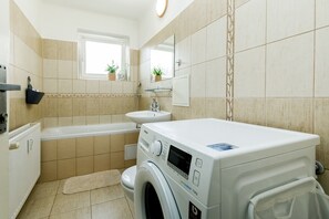 Hair dryer, towels, soap, shampoo