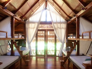 1 Bed in 12-bed Community Villa | Bed sheets - Harana Surf Resort - Hostel (General Luna)