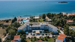 An aerial view of a resort with a pool, beach, and ocean views. - Brown Beach Evia Island, a member of Brown Hotels (Eretria)