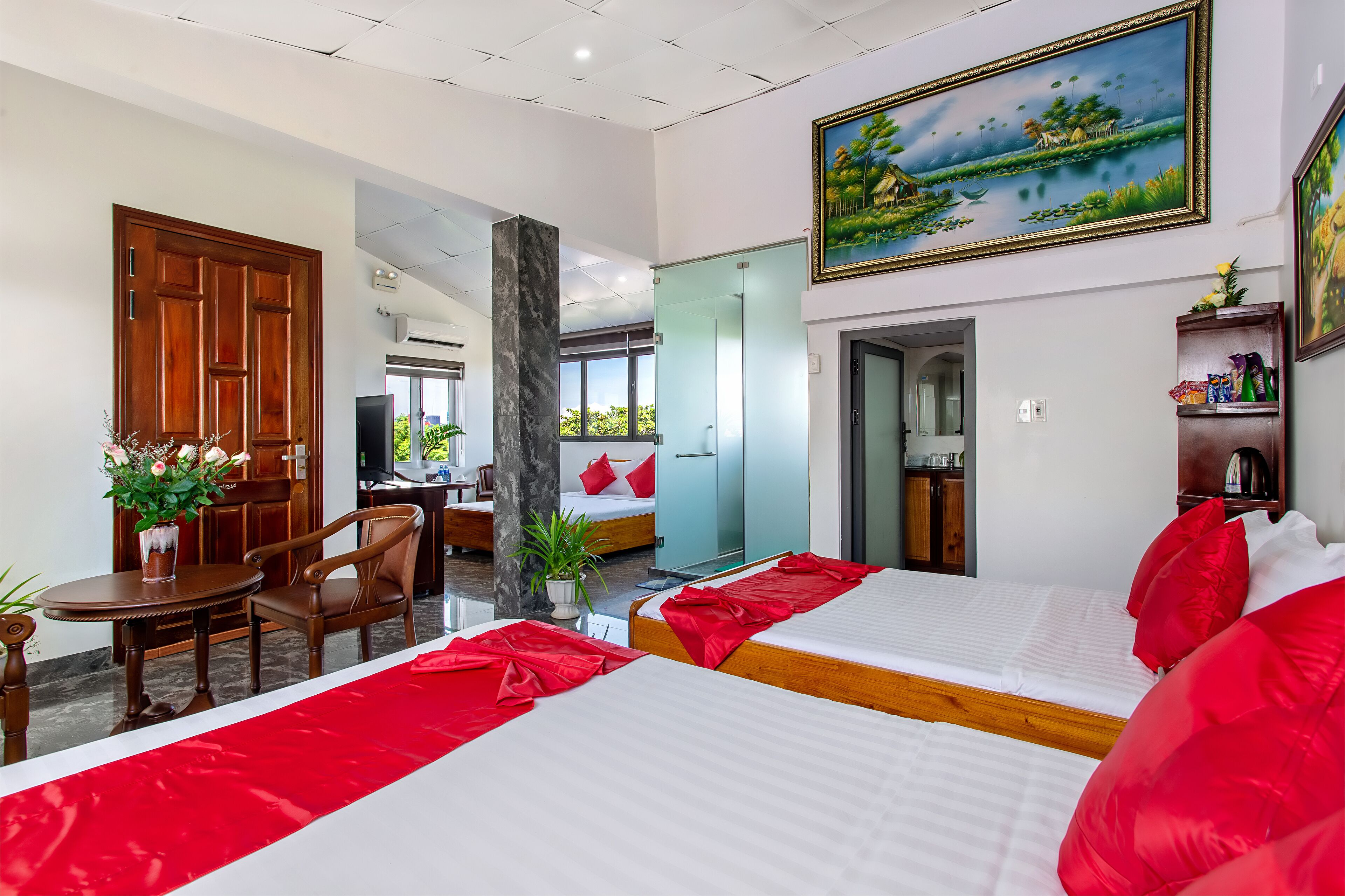 Family Room, City View | Minibar, in-room safe, desk, laptop workspace