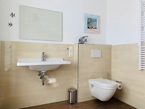 Hair dryer, towels, soap, toilet paper