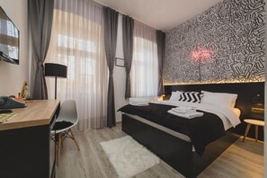 1 slaapkamer, een strijkplank/strijkijzer, gratis wifi, beddengoed