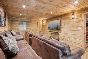 Cabin, 4 Bedrooms | Living area | 30-inch Smart TV with cable channels, TV