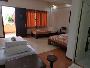 Deluxe Quadruple Room | Bed sheets - Mt. Bagarabon Beach and Mountain Resort (Surigao)
