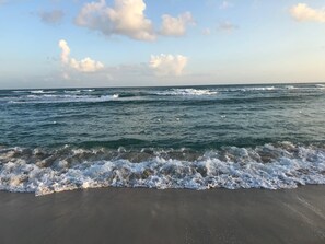 On the beach, sun loungers, beach towels