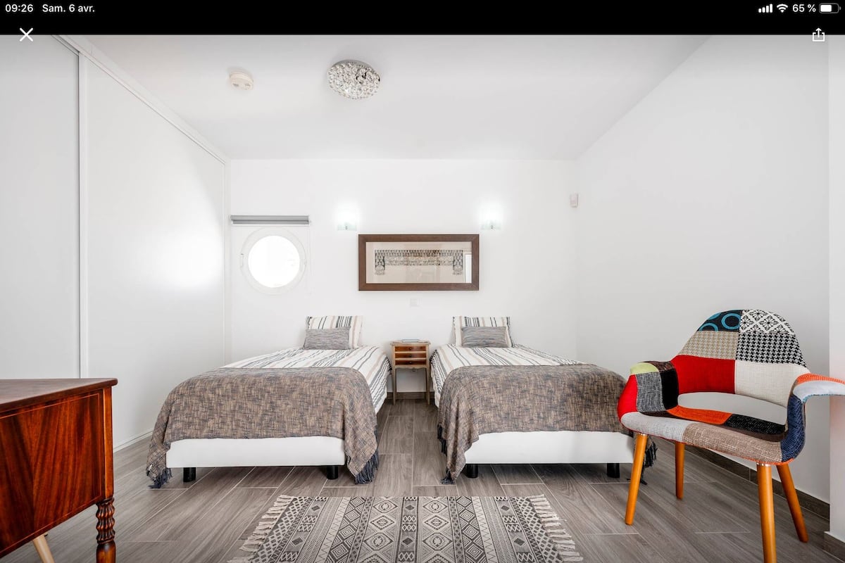 Memory-foam beds, in-room safe, desk, laptop workspace