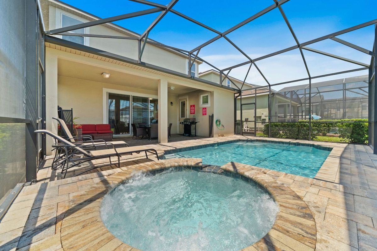 - Private screened-in pool, perfect for unwinding or family fun
- Rejuvenate in the bubbling hot tub, an elegant addition to your vacation experience
- Lounge on the sunbeds & savor the serene atmosphere in this beautifully designed outdoor space


