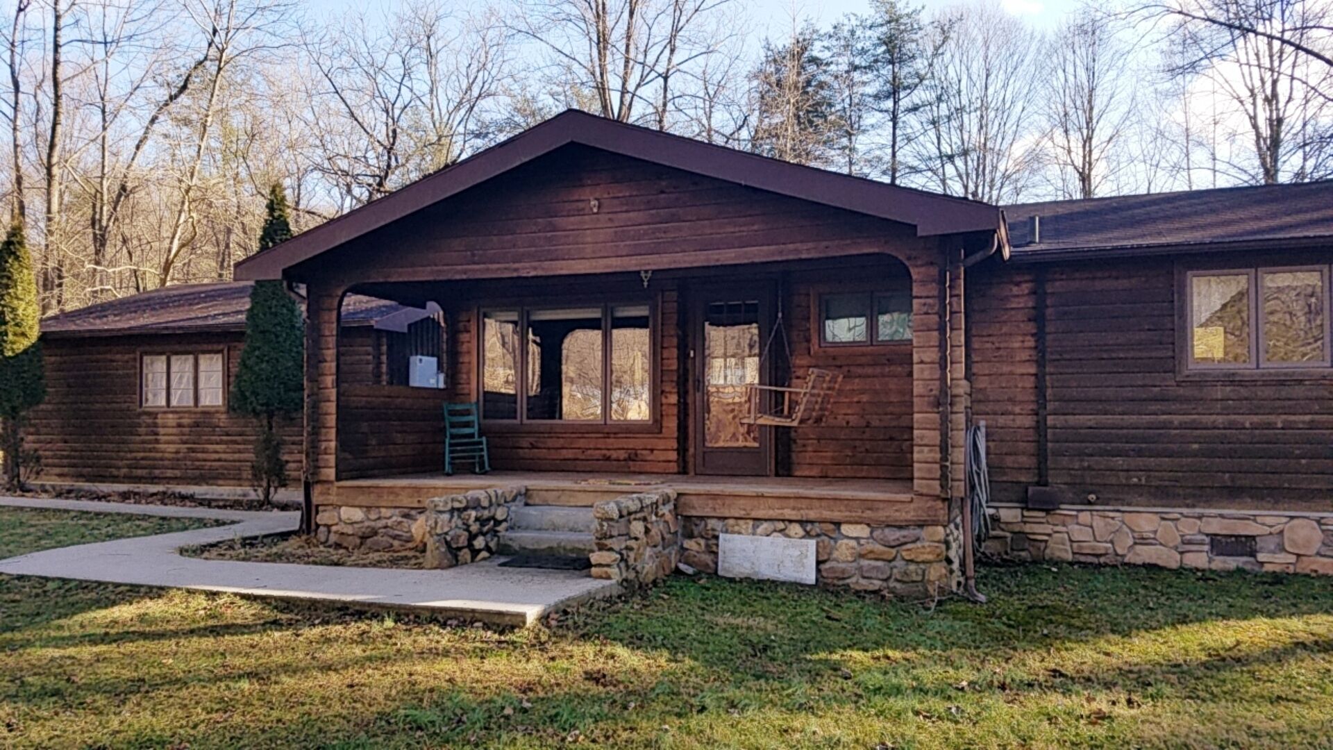 Tree swing, Outdoor dining with Stream and Fire Pit, Large Yard, Sunroom, Trail