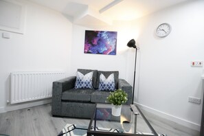 Economy Apartment | Living area | LCD TV, Netflix, streaming services