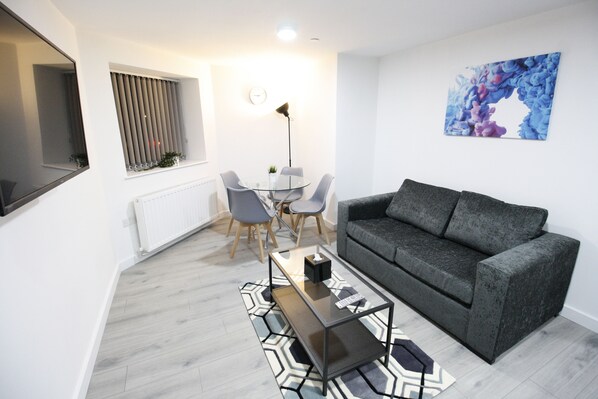 Comfort Apartment | Living area | LCD TV, Netflix, streaming services - Willow Serviced Apartments - Northcote Street (Cardiff)