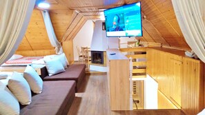 Exclusive Penthouse (With Sauna) | Living room | 65-inch Smart TV with digital channels, TV, Netflix