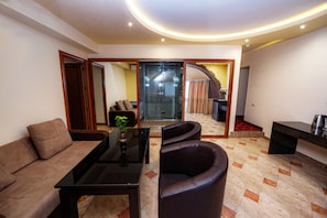 Family Suite, Jetted Tub | Living room | 32-cm Smart TV with cable channels, TV - Skyline Hotel Yerevan (Yerevan)
