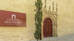 A building facade with a sign reading "CONVENTO DAS BERNARDAS RESIDENCE". - FLH Cozy Tavira with Pool (Tavira)