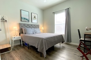 1 bedroom, desk, iron/ironing board, travel cot