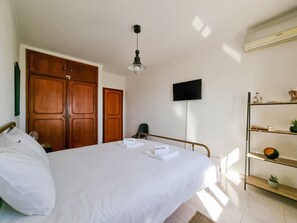 2 dormitorios, tabla de planchar con plancha, wifi gratis y ropa de cama