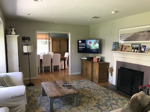 Living room looking to dining area