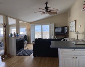 Smart TV, fireplace, DVD player, books