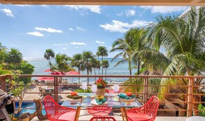Outdoor dining - Spacious beachfront condo with AC, WiFi, swimming pool! (AKUMAL)
