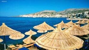 On the beach, sun loungers