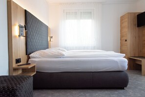 Chambre Double Deluxe | Literie hypoallergénique, minibar, coffres-forts dans les chambres