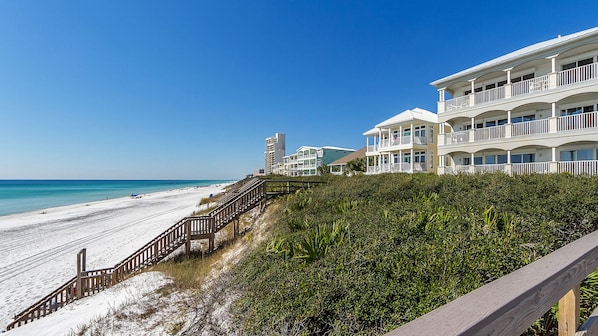 Enjoy ocean views from the hotel's balconies, which offer access to the beach via a wooden boardwalk.