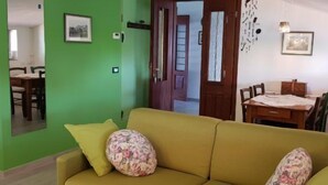 Design Room, Ensuite, Mountain View | Living area | Flat-screen TV - Books&Bikes (Buia)