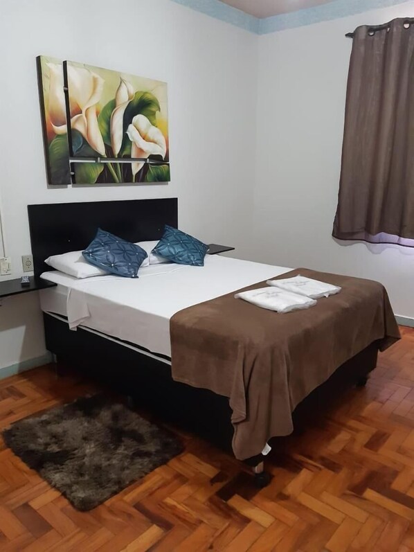 Hypo-allergenic bedding, desk, laptop workspace, free WiFi