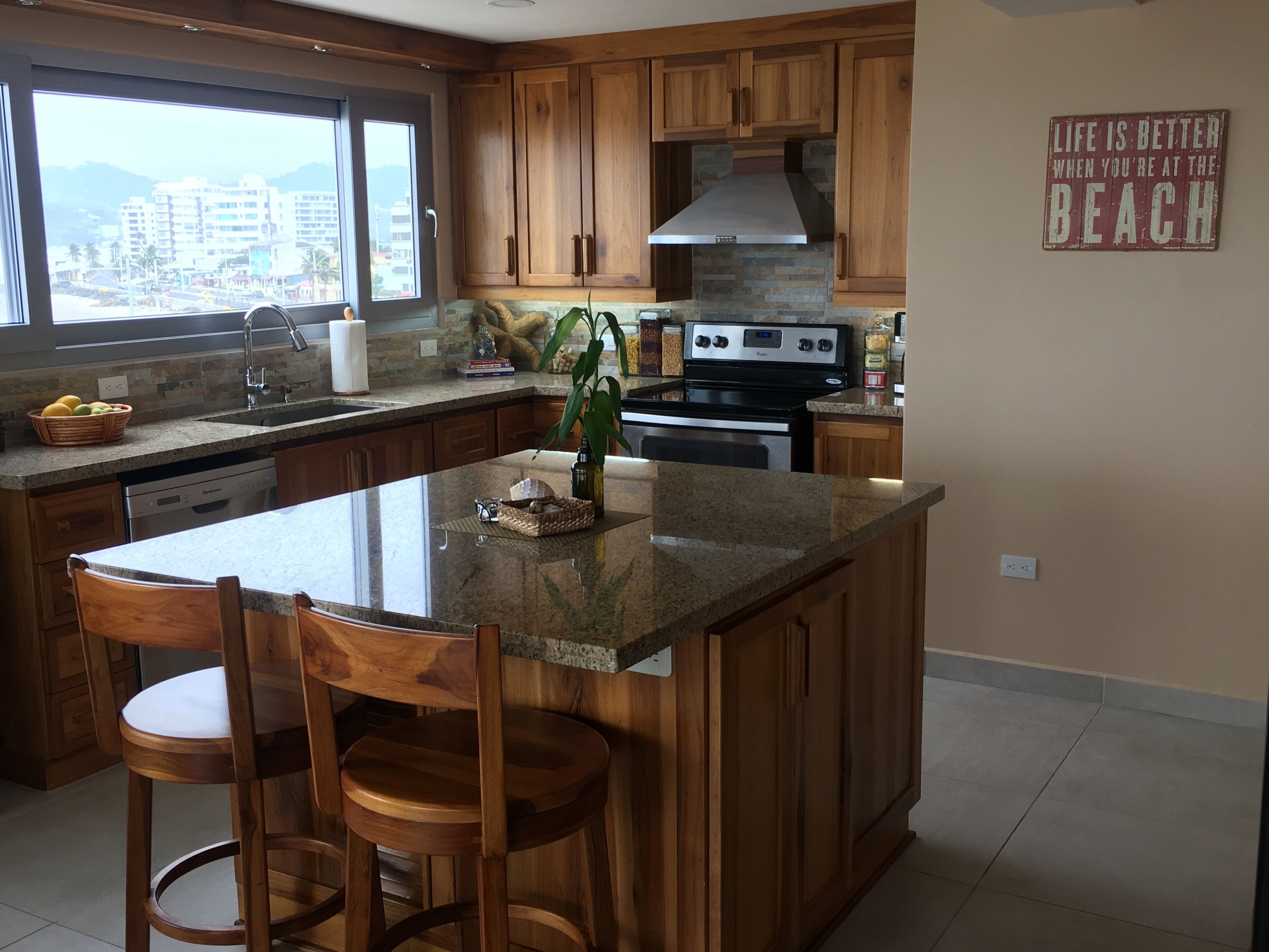 Panoramic Condo | Private kitchen | Full-sized fridge, microwave, oven, stovetop