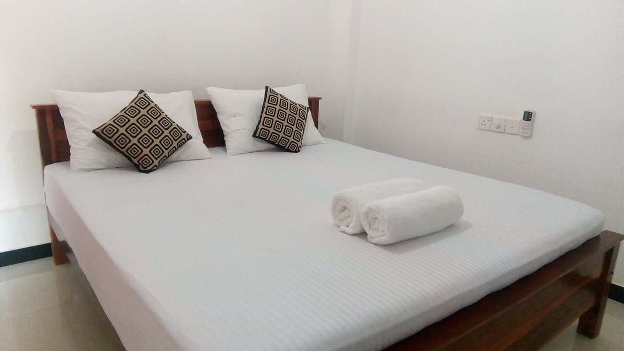 Chambre Deluxe, plusieurs chambres, balcon, vue jardin | Literie de qualité supérieure, matelas mémoire de forme, bureau