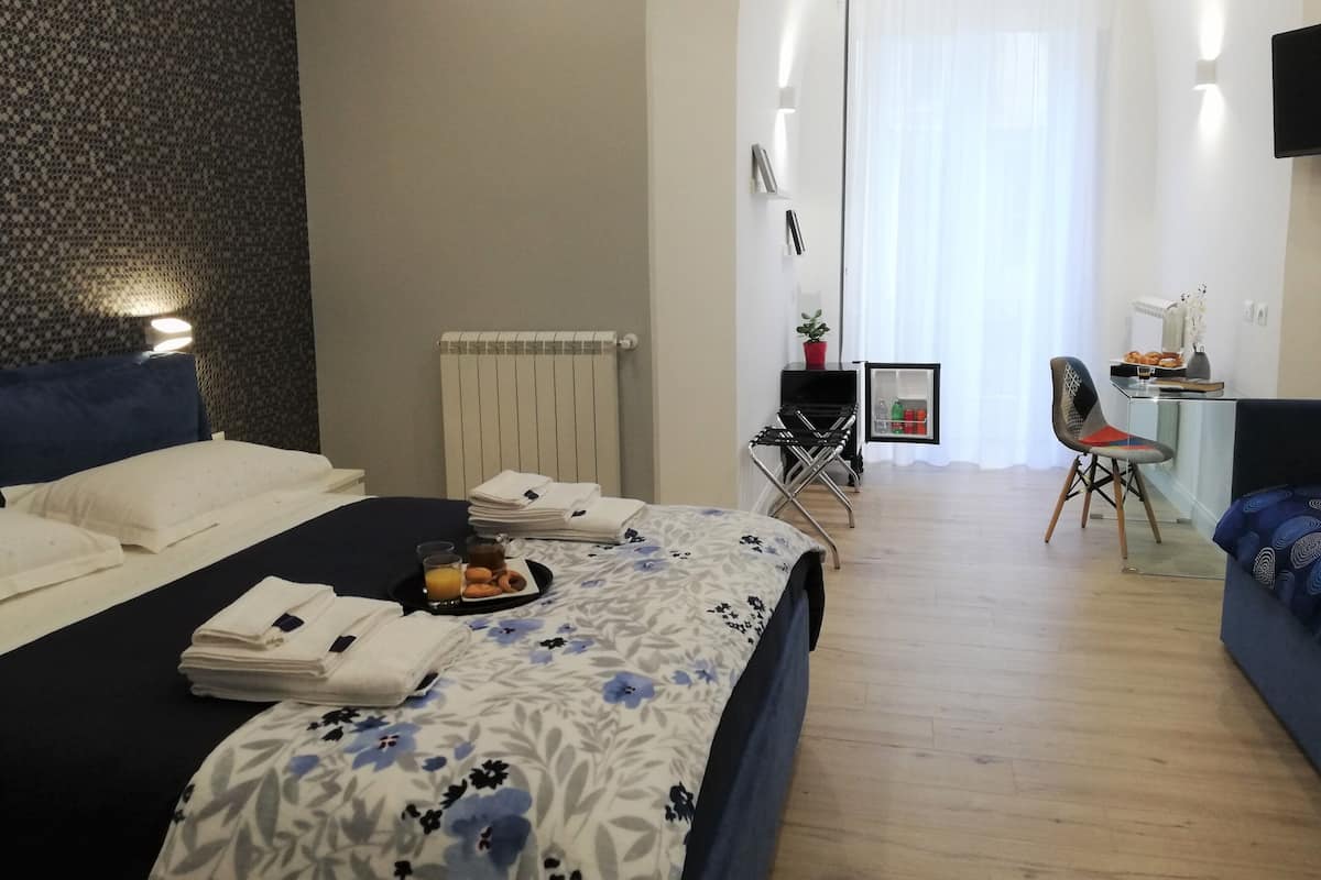 Executive fyrbäddsrum | Sängtillbehör av högsta kvalitet, duntäcken och memory foam-madrasser
