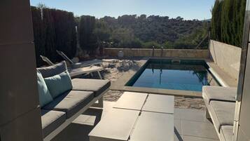 Outdoor pool, sun loungers