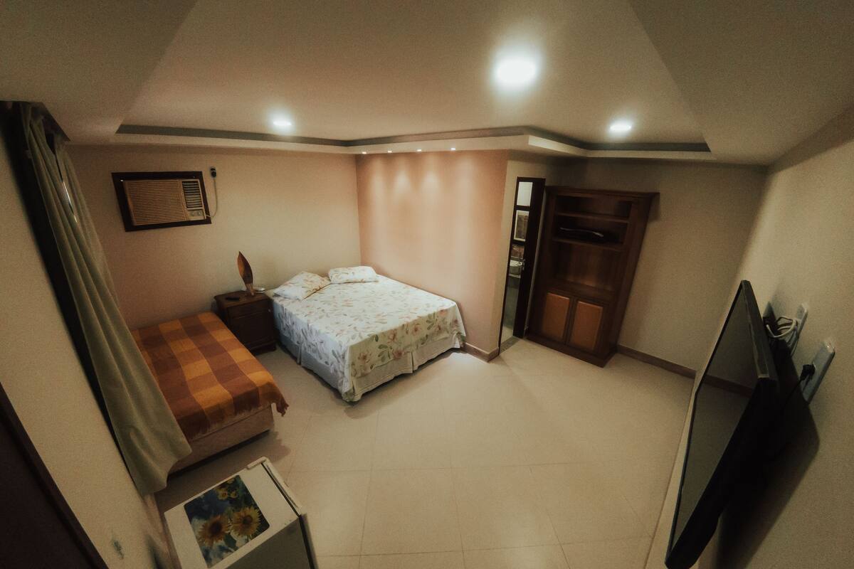 Deluxe Quadruple Room | Minibar, soundproofing, iron/ironing board (on request), WiFi (free)