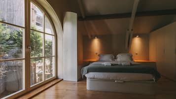 Apartamento conforto, vista para o jardim | 2 quartos, quartos à prova de som, Wi-Fi de cortesia, roupa de cama
