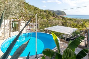 Seasonal outdoor pool, pool umbrellas, sun loungers