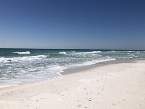 On the beach, sun loungers, beach towels