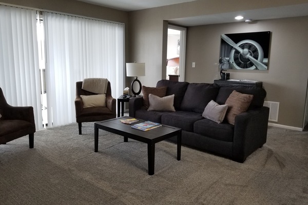 Cozy living room with a queen size sleeper sofa.