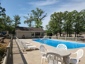 Outdoor pool, a heated pool - Great Location! Updated Condo with beautiful view of the channel & boat slip! (Osage Beach)