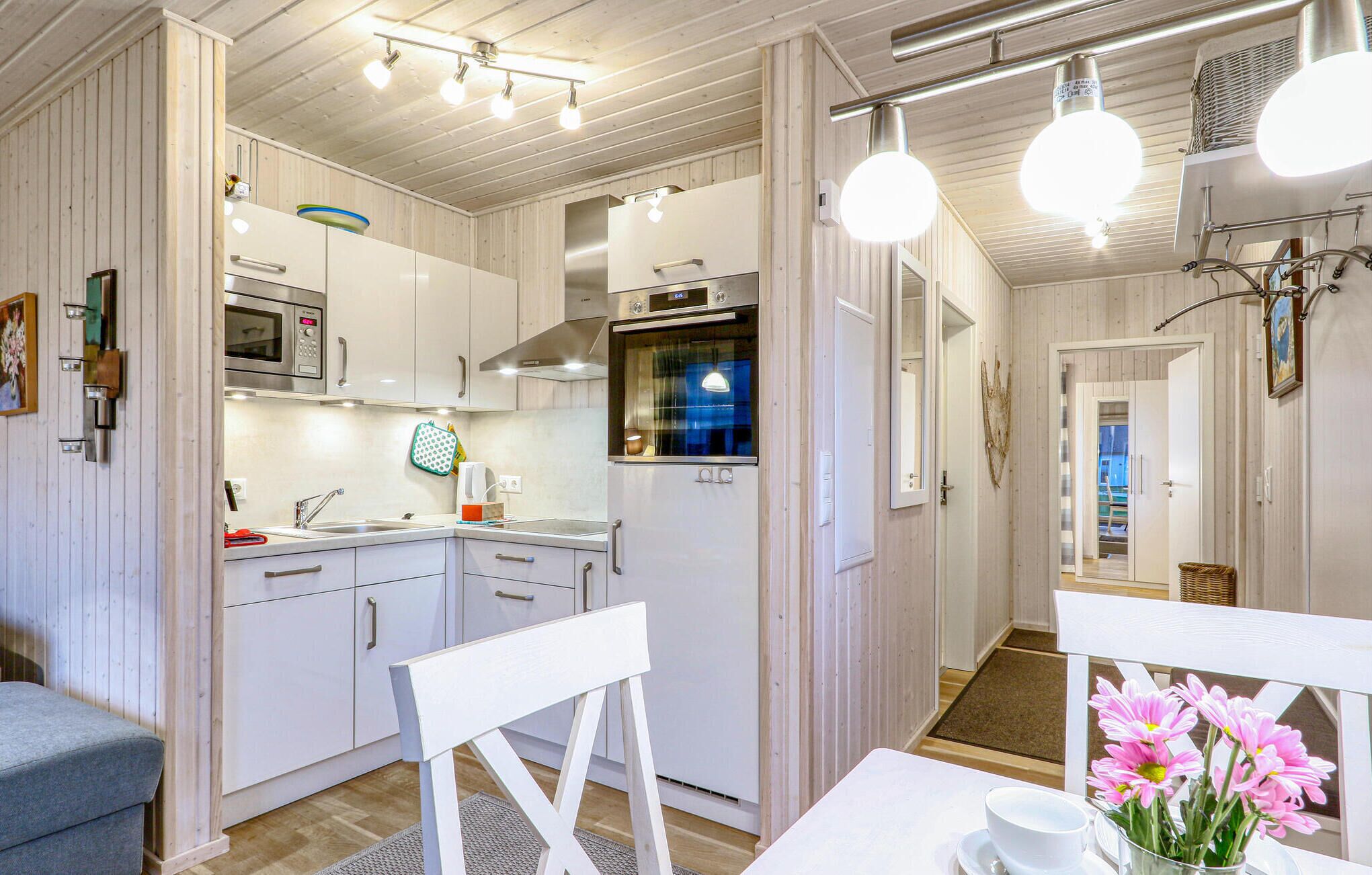 Fridge, stovetop, dishwasher, coffee/tea maker