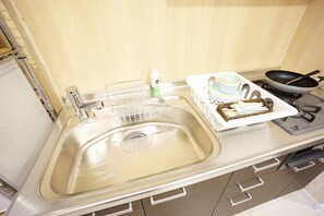 Apartment | Eigene Kochnische | Kühlschrank, Mikrowelle, Herdplatte, Wasserkocher