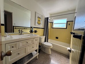 Combined shower/bathtub, hair dryer, towels, soap