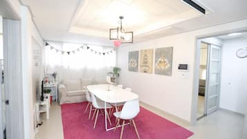 Lovely House | Living area | Flat-screen TV