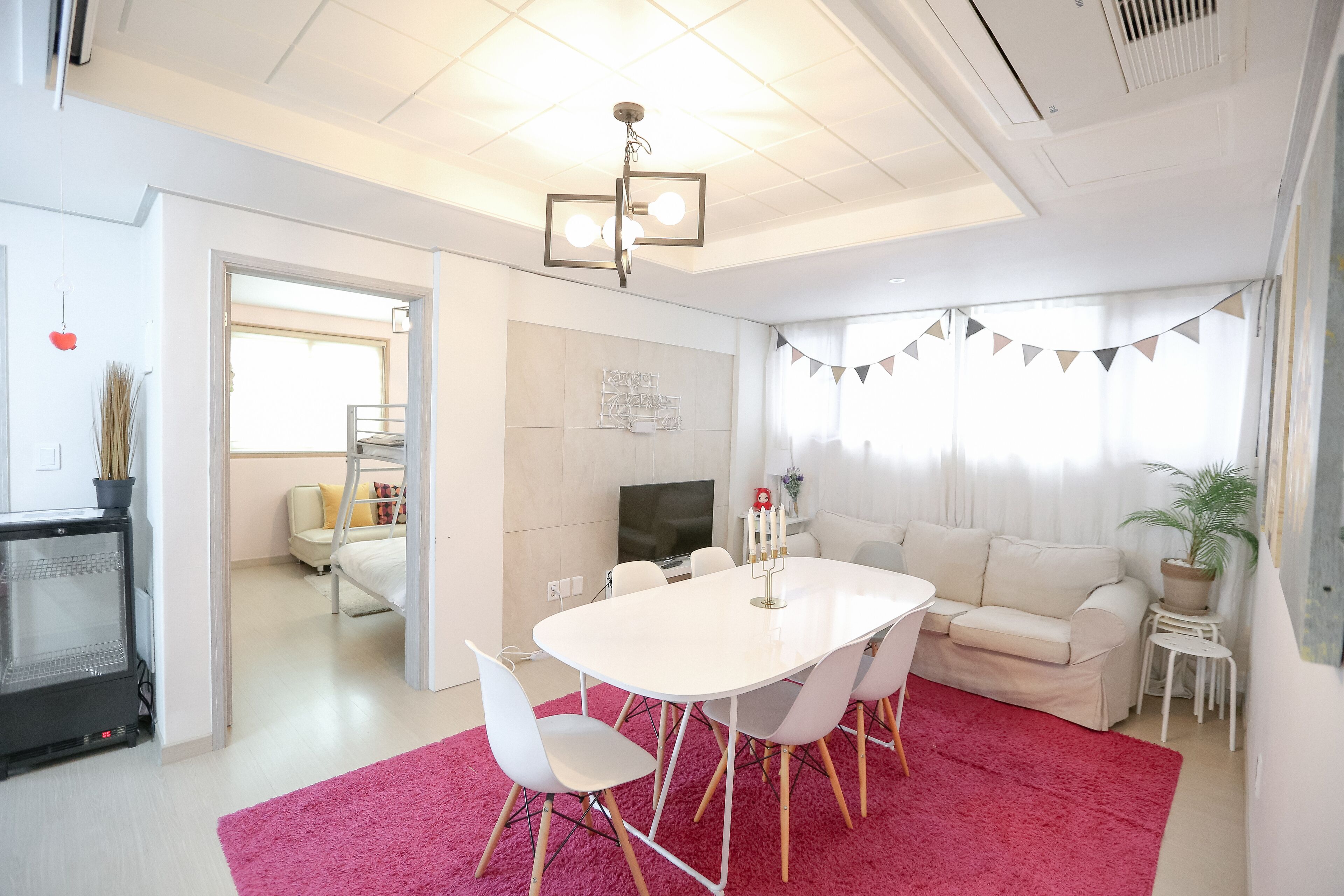 Lovely House | Living area | Flat-screen TV