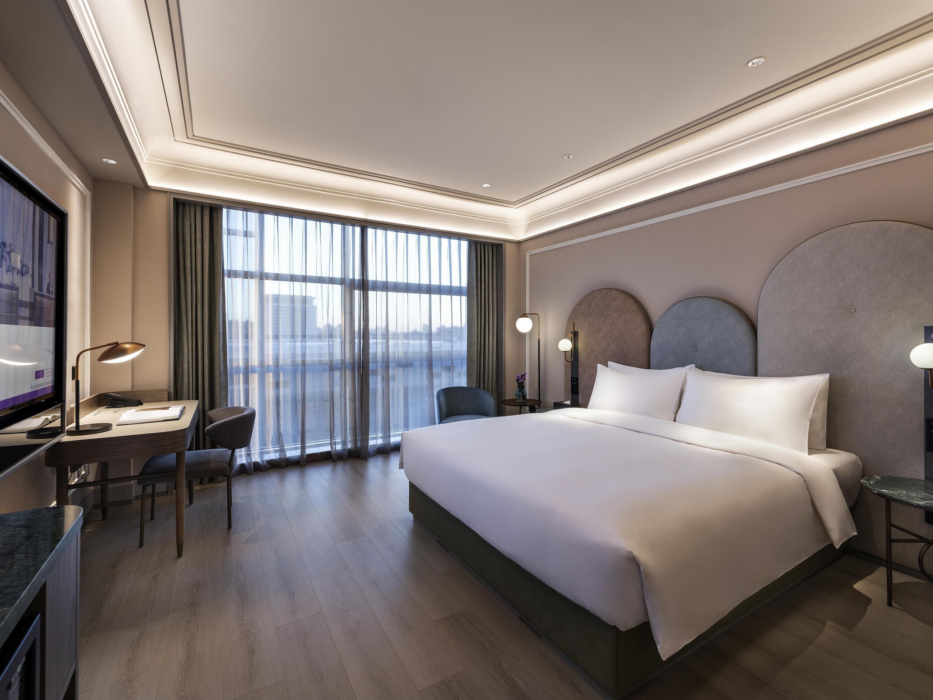 Standard Room, 1 King Bed | Free minibar, in-room safe, individually decorated, desk